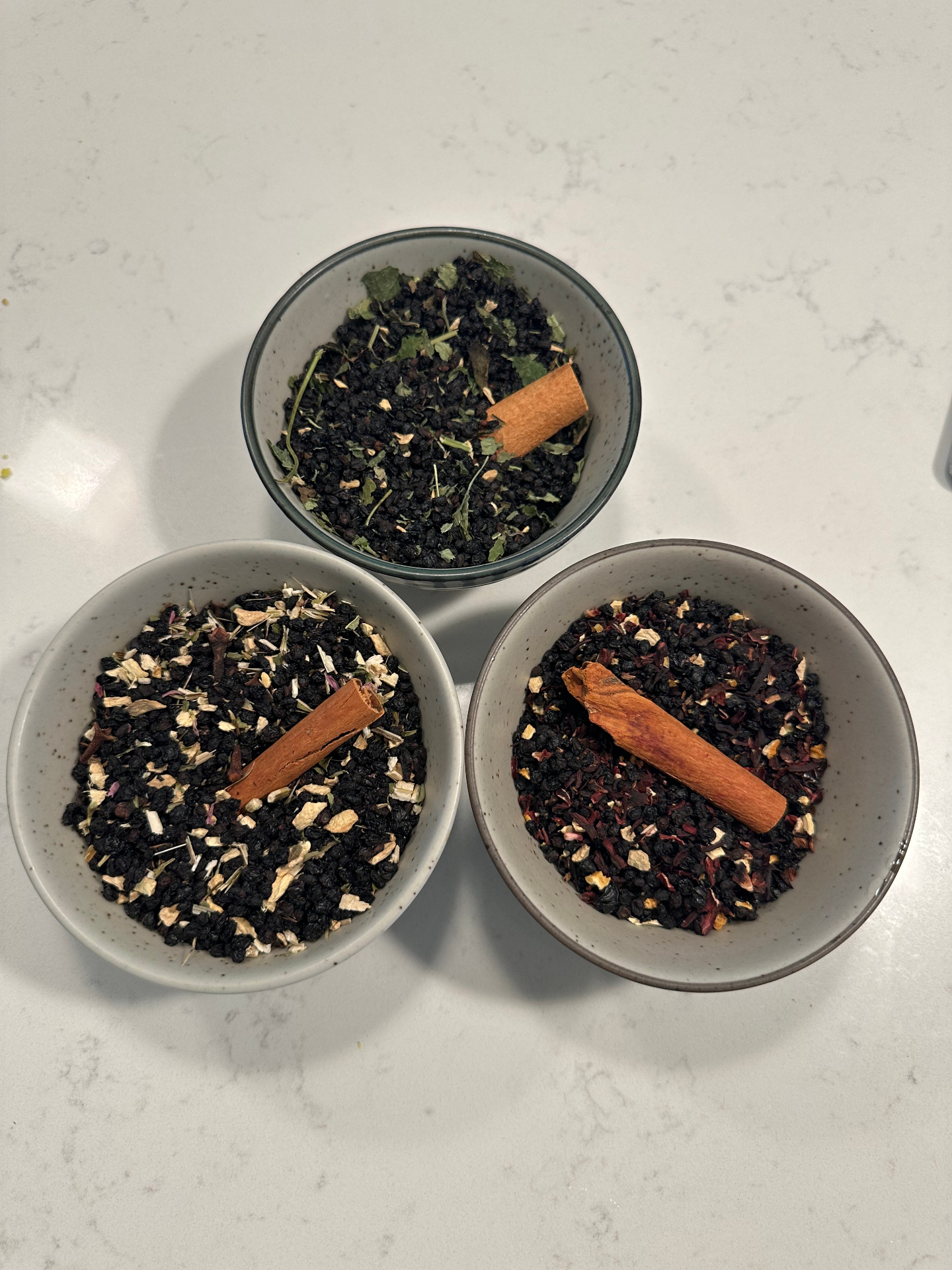 Classic Elderberry botanical tea blend in a ceramic bowl